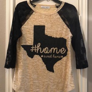 Three quarter length sleeve Texas T-shirt with lace sleeves.